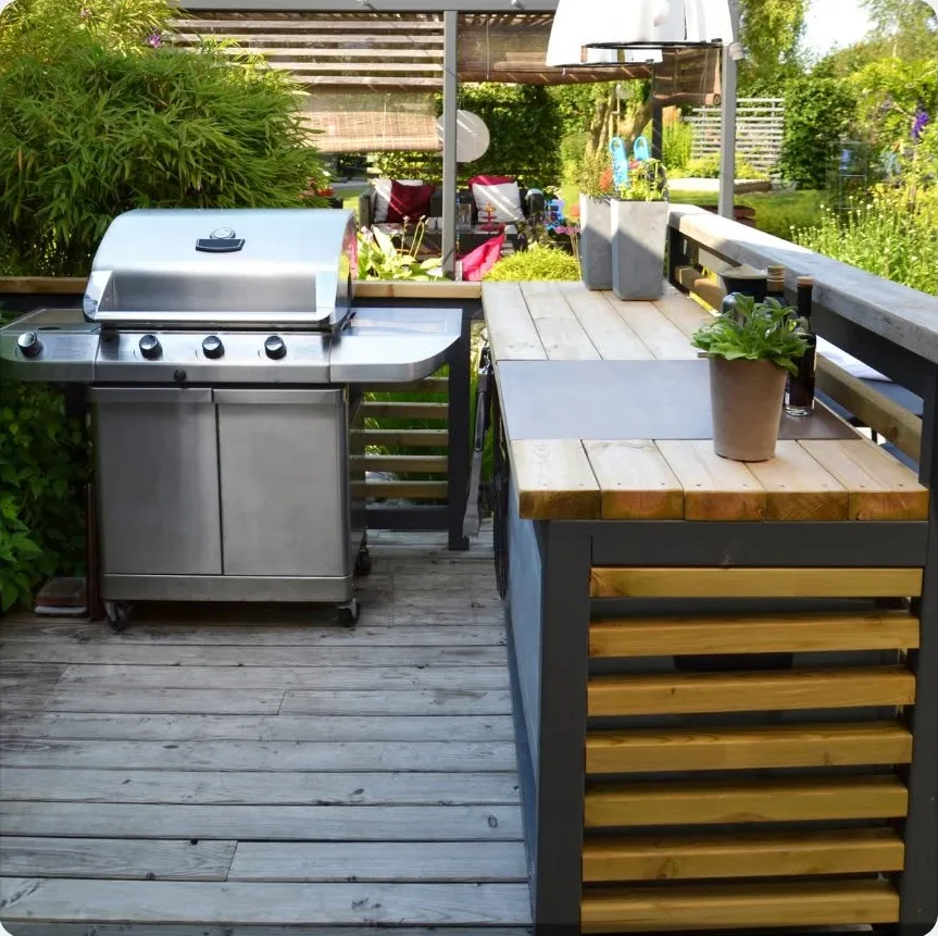 Sheltered outdoor kitchen and BBQ area under a veranda roof