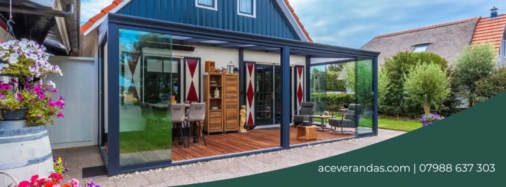 Aluminium and glass veranda with sliding glass walls and dining area, installed by Ace Verandas